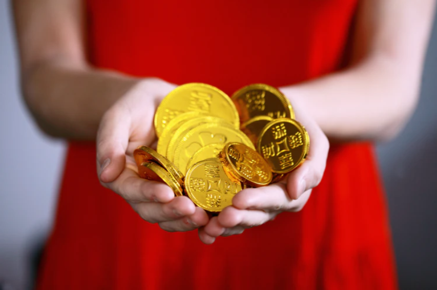 person holding gold