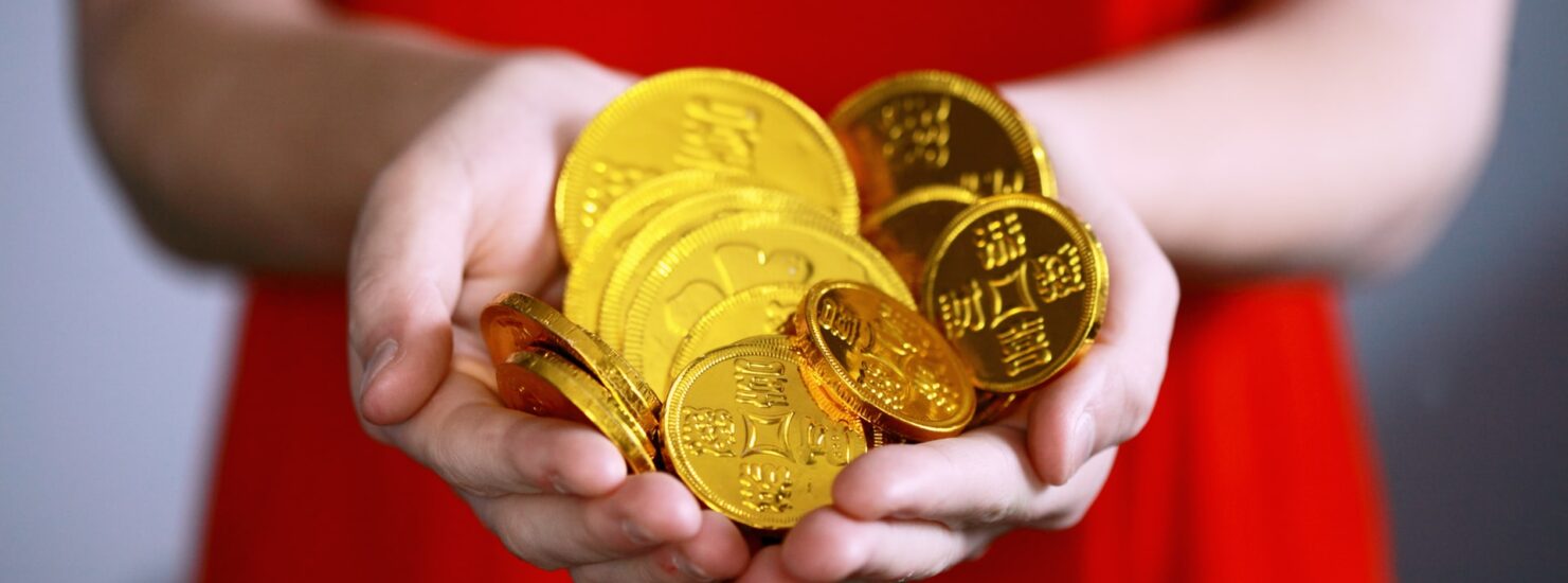 person holding gold